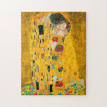 Gustav Klimt The Kiss Jigsaw Puzzle<br><div class="desc">Puzzle featuring Gustav Klimt’s oil painting with gold leaf The Kiss (1908). A man and woman, wearing brilliant golden colours, lovingly embrace and kiss in a field of flowers. A great gift for fans of Art Nouveau and Austrian art.</div>