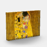 Gustav Klimt's The Kiss famous painting.  Photo Block<br><div class="desc">Gustav Klimt's The Kiss famous painting. Photo Block.</div>