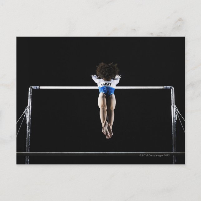 Gymnast (9-10) reaching for uneven bars postcard (Front)