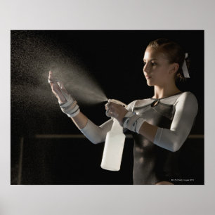 Gymnast spraying water on hands poster