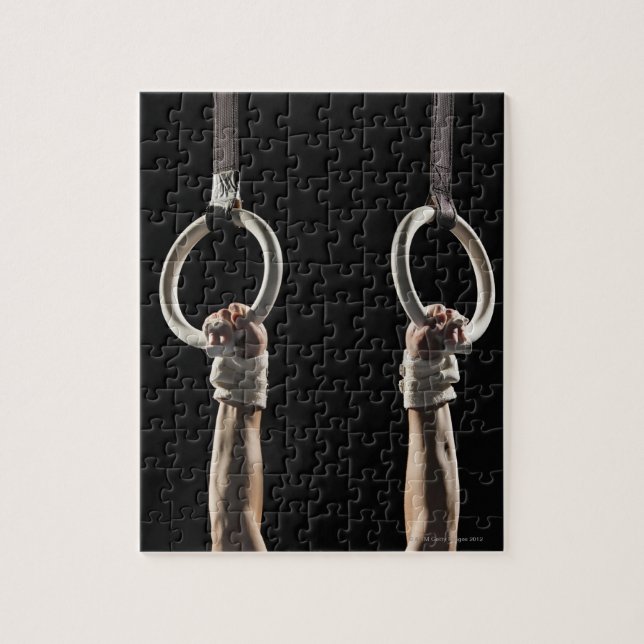 Gymnast swinging from rings 2 jigsaw puzzle (Vertical)