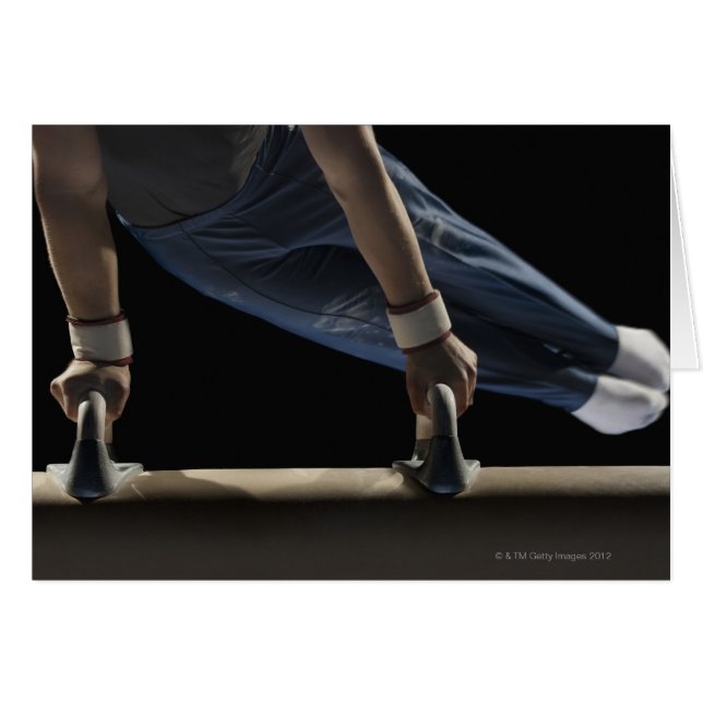 Gymnast swinging on pommel horse (Front Horizontal)