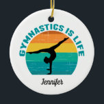 Gymnastics is Life Beautiful Sunset Gymnast Custom Ceramic Ornament<br><div class="desc">Gymnastics is Life. Cute monogram sunset gymnast gift featuring a beautiful colourful background behind a woman doing a pretty handstand with the splits. Customize this cool Christmas ornament with your name.</div>