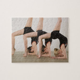 Gymnasts posing upside down jigsaw puzzle