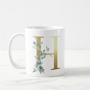 H golden initial with blue floral foliage coffee mug