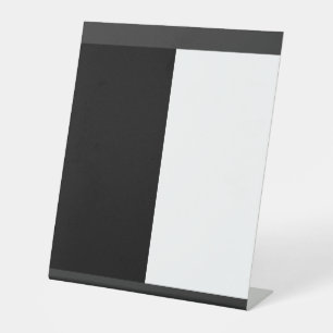 half white half black, half black half white pedestal sign