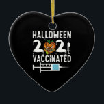 Halloween 2021 Vaccinated Funny Costume Ceramic Ornament<br><div class="desc">Halloween 2021 Vaccinated Funny Costume
vaccinated, vaccine, halloween, 2021, gift, ideas, scary, pumpkin, birthday, halloween trick or treat, spooky, horror, zombie, black, ghost, trick or treat, witch, skull, humour, vintage, retro, gifts</div>