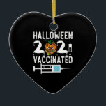 Halloween 2021 Vaccinated Funny Costume Ceramic Ornament<br><div class="desc">Halloween 2021 Vaccinated Funny Costume
vaccinated, vaccine, halloween, 2021, gift, ideas, scary, pumpkin, birthday, halloween trick or treat, spooky, horror, zombie, black, ghost, trick or treat, witch, skull, humour, vintage, retro, gifts</div>