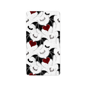Halloween heart with black bat wings label