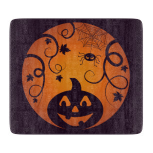 Halloween Jack o lantern pumpkin face and spider Cutting Board