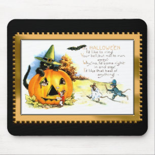 Halloween Kitty Sitting in Jack O Lantern Mouse Pad
