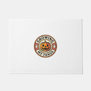 Halloween Pumpkin Growing My Fangs Vintage Badge_1 Doormat