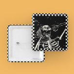 Halloween Scary Skeleton Black White Chequered 2 Inch Square Button<br><div class="desc">Halloween Scary Skeleton Black White Chequered Retro Buttons features a scary skeleton surrounded by a black and white chequered pattern. Perfect for your Halloween party. Designed by ©Evco Holidays www.zazzle.com/store/evcoholidays</div>