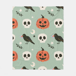 Halloween seamless pattern with ravens, skulls and fleece blanket