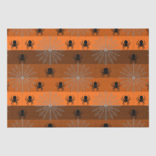 Halloween spider webs with spiders on orange. wrap tissue paper