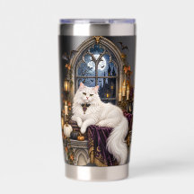 HALLOWEEN THEMED WHITE CAT IN WINDOW