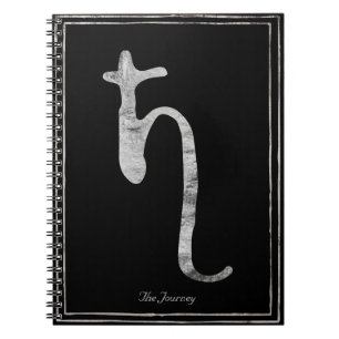 Hammered silver stylized planet Saturn symbol Notebook