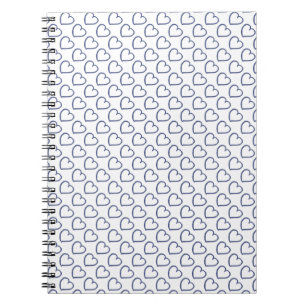Hand drawn hearts design dark blue on white notebook