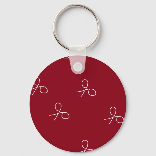 Hand drawn scissors on maroon red keychain (Front)