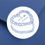 Hand Drawn Vintage Cake Blue Whimsical Wedding Classic Round Sticker<br><div class="desc">Personalized Vintage Cake Wedding Monogram Stickers. These custom round wedding stickers feature a simple vintage-style cake illustration at the centre, accented with elegant blue details and topped with the couple’s monogram initials and wedding date for a timeless and sophisticated touch. The minimalist design showcases a mix of classic serif and...</div>