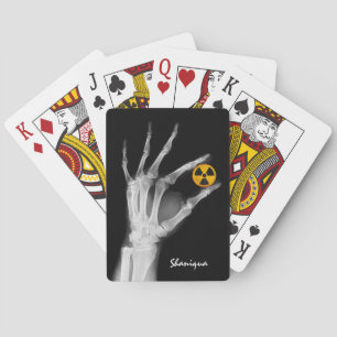 Hand Holding a Radiation Symbol  Playing Cards