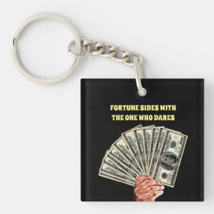 hand holding hundred dollar bills money finance keychain