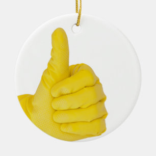 Hand in yellow latex glove ceramic ornament
