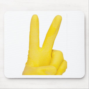 Hand in yellow latex glove mouse pad
