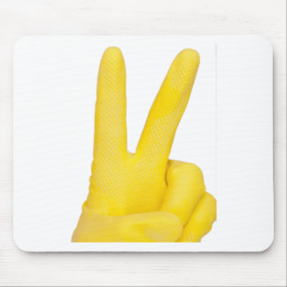 Hand in yellow latex glove mouse pad
