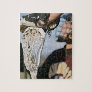 Hand on a Lacrosse Stick Jigsaw Puzzle