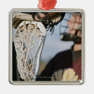 Hand on a Lacrosse Stick Metal Ornament