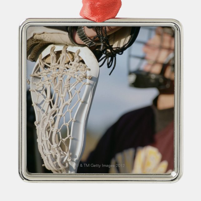 Hand on a Lacrosse Stick Metal Ornament (Front)