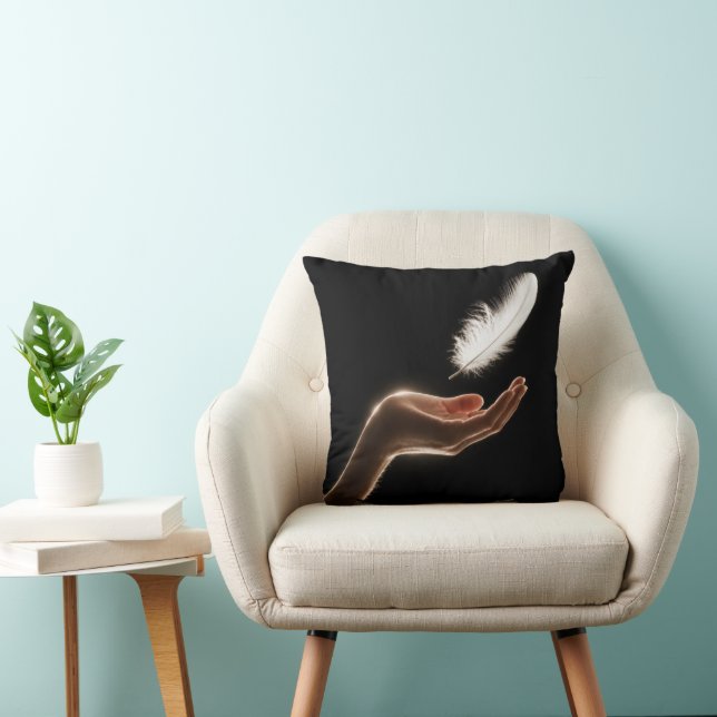 Hand Releasing a White Feather Throw Pillow (Chair)
