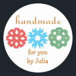 "Handmade" holiday gift label<br><div class="desc">Cute, classy gift label for the holidays, featuring kids' snowflake cutouts. Perfect for any homemade gift, from a tin of cookies to a hand-knit scarf. Personalize in a flash by replacing our sample name with yours. Creators give half their proceeds to children's charities.</div>