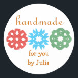 "Handmade" holiday gift label<br><div class="desc">Cute,  classy gift label for the holidays,  featuring kids' snowflake cutouts.  Perfect for any homemade gift,  from a tin of cookies to a hand-knit scarf.  Personalize in a flash by replacing our sample name with yours.  Creators give half their proceeds to children's charities.</div>