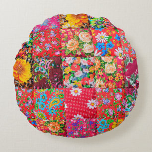 Handmade patchwork quilt with floral pattern as ba round pillow