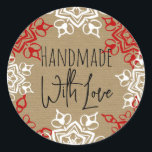 Handmade with Love Snowflake Christmas Craft Classic Round Sticker<br><div class="desc">Brown craft paper background print pattern with red and white snowflake shapes around the border of this fun crafty card. Modern and unique Personalized gift tag label sticker. Add your custom text. The look of brown paper bag sack type recycled-looking textured print is modern and fun!</div>