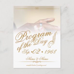 Hands of a coloured wedding couple pin on ring gol announcement postcard