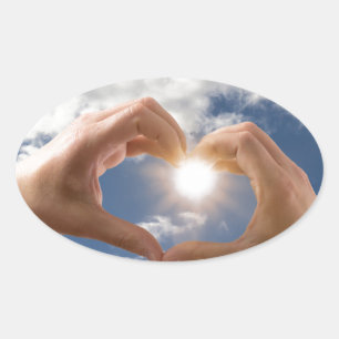 Hands of love oval sticker