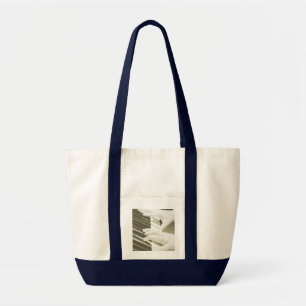 hands playing piano bag