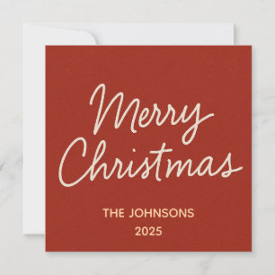 Handwritten Merry Christmas Greeting on Red Holiday Card