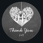 Hanging Heart Tree Chalkboard Wedding Collection Classic Round Sticker<br><div class="desc">These wedding stickers feature a romantic hanging tree, and soon to be husband and wife, which is carved in the shape of a heart. The chalkboard effect background makes these stickers perfect for any couple planning a chic modern wedding. These stickers can easily be customized to suit your party needs...</div>