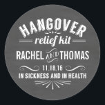Hangover Relief Kit | Chalkboard Wedding Favour Classic Round Sticker<br><div class="desc">Treat your guests to some recovery essentials (pain reliever, water, snacks) and seal up your care packages with these cute stickers. Design features "Hangover Relief Kit -- In Sickness and in Health" in white vintage apothecary style text on a brushed grey chalkboard background. Personalize with your names and wedding date;...</div>