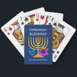 HANUKKAH BLESSINGS  PLAYING CARDS<br><div class="desc">Modern, stylish HANUKKAH BLESSINGS playing cards, designed with large menorah (hanukkiyah) at the centre, and blue dreidel and colourful Star of David on either side. Text reads HANUKKAH BLESSINGS with a placeholder name at the bottom. Both of these are CUSTOMIZABLE so you can personalize with your own greeting or heading,...</div>