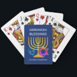 HANUKKAH BLESSINGS PLAYING CARDS<br><div class="desc">Modern, stylish HANUKKAH BLESSINGS playing cards, designed with large menorah (hanukkiyah) at the centre, and blue dreidel and colourful Star of David on either side. Text reads HANUKKAH BLESSINGS with a placeholder name at the bottom. Both of these are CUSTOMIZABLE so you can personalize with your own greeting or heading,...</div>