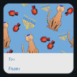Hanukkah Cat Dreidel Blue Gift Tag Sticker<br><div class="desc">Cat lovers will be delighted with this fun whimsical "Hanukkat" pattern gift tag sticker, featuring an orange brown curious tabby cat wearing a kippah, red dreidels and yellow menorahs/channukiahs on a bright blue background. Perfect for wrapping your Hannukah / Chanukah gifts during the Jewish Festival of Lights! Personalize the text...</div>