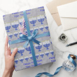 Hanukkah Dark Blue Menorah Silver Personalized Wrapping Paper<br><div class="desc">Elegant personalized Happy Hanukkah wrapping paper with a faux silver fabric background. Dark blue Menorahs with a white Star Of David motif feature your custom text. Visit my store to see the matching gift wrap supplies such as gift tags, gift bags, ribbon and tissue paper. Wrap your Hanukkah Holiday gifts...</div>