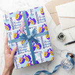 Hanukkah Dreidels Colourful Pattern Personalized Wrapping Paper<br><div class="desc">This colourful Hanukkah Dreidels pattern wrapping paper is personalized with your name and short message. Easy to customize, this one of a kind Dreidel gift wrap features my original artwork, two spinning tops in vibrant shades of blue, purple, pink and yellow for an unexpected bit of fun. Set on a...</div>