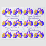 Hanukkah Dreidels Colourful Personalized Fun Kids Tissue Paper<br><div class="desc">Choose this fun personalized Happy Hanukkah tissue paper covered in colourful Dreidels for kids... and adults too! Four sections of dark blue text can be personalized by adding your name to the HAPPY HANUKKAH message - two sections of light blue text proclaim "Oy! To The World". Either set of text...</div>