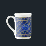 Hanukkah Festival Party Gold Menorah blue pattern Bone China Mug<br><div class="desc">First Candle of Hanukkah. Happy Hanukkah Festival of lights party decoration beauty Jewish holiday gold ornaments design. Vintage Jewish Holiday Chanukkah Navy blue background with traditional Chanukah decorative symbols decor - Gold hanukkiah - menorah, candles, star of David and glowing lights wallpaper gold hanukkiah, wooden dreidels (spinning top toy) with...</div>